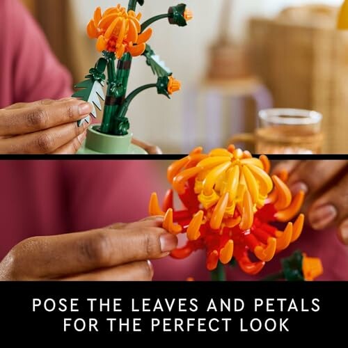 Hands assembling a colorful flower toy with orange petals.