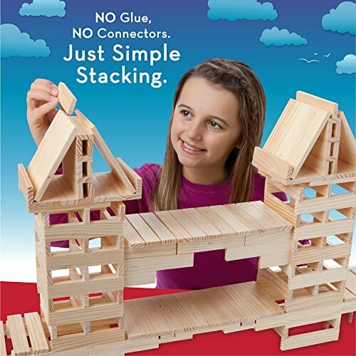 Child stacking wooden blocks to build structures.