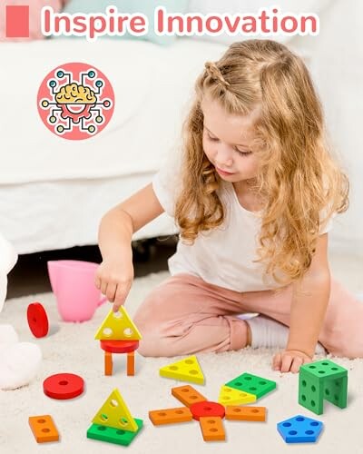 Child playing with colorful educational toys on the floor.