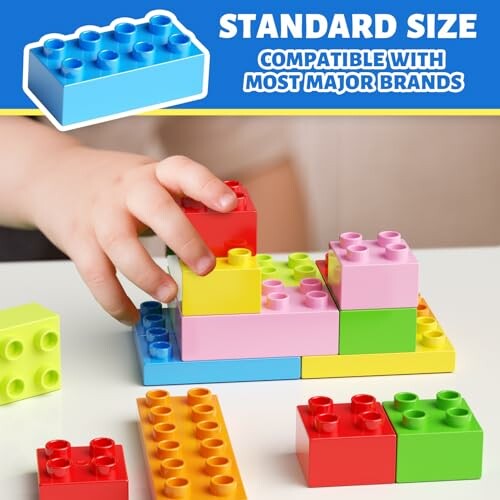 Child stacking colorful interlocking building blocks.