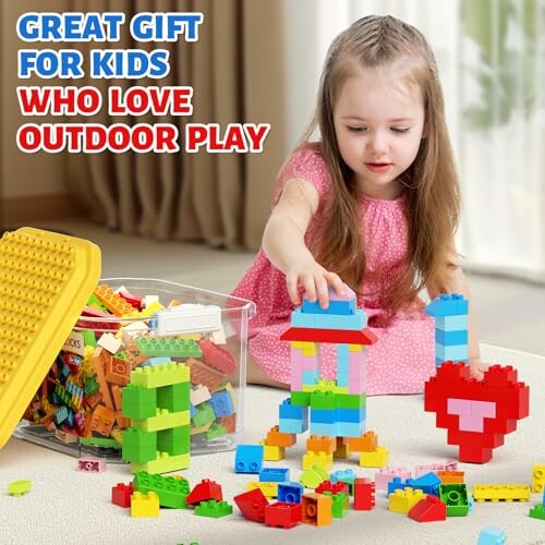 Child playing with colorful building blocks beside a container.