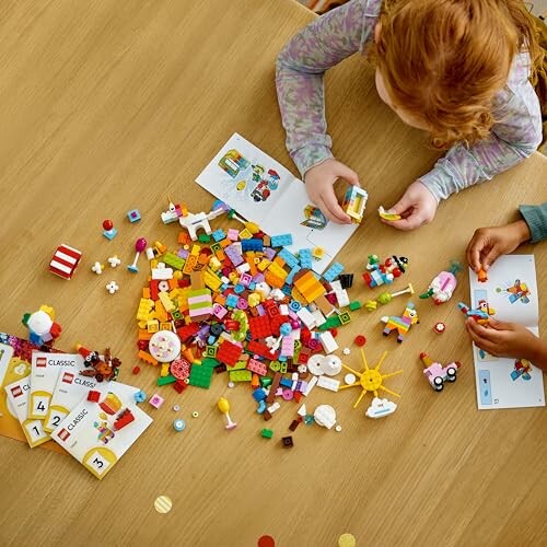 Two children assembling colorful LEGO pieces on a table.