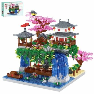 Lego set of a Chinese garden with pagoda and cherry blossoms.