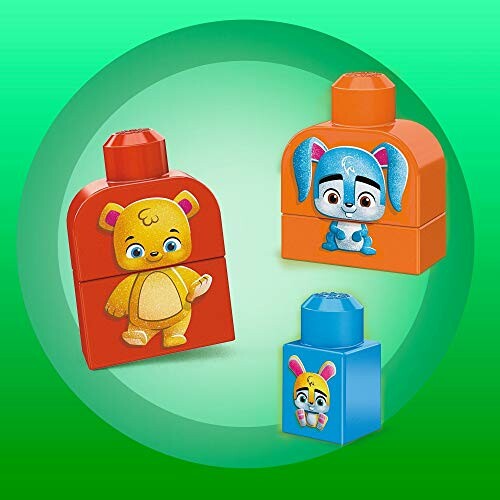 Toy blocks with animal designs on a green background