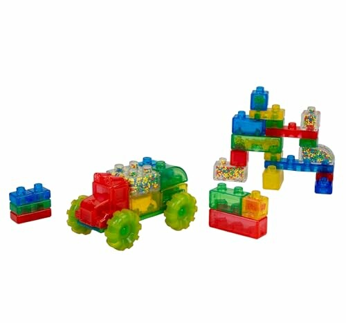 Colorful building blocks with a toy vehicle and structure.