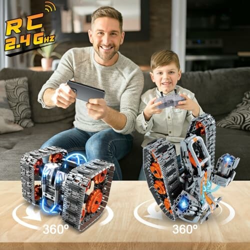 Father and son playing with remote-controlled robots on a couch.