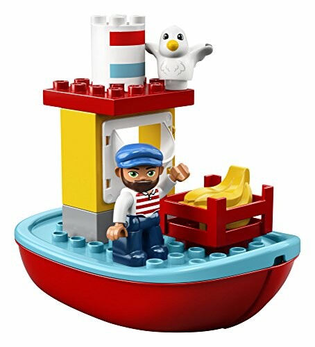 LEGO toy boat with sailor and seagull.