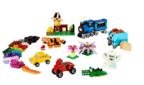 Colorful LEGO bricks and models including a train, animals, and vehicles.