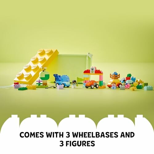 LEGO set with wheelbases and figures on a green background.