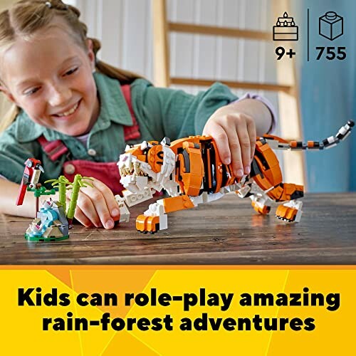 Child playing with LEGO tiger and rainforest set