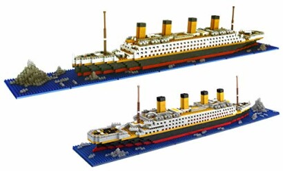 Two LEGO models of the Titanic on a blue base.