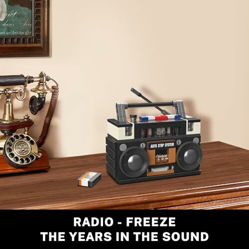 Vintage radio and telephone on a wooden table