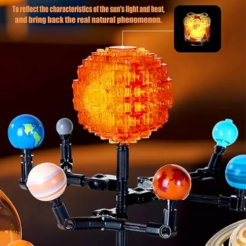 Solar system model with glowing sun and planets