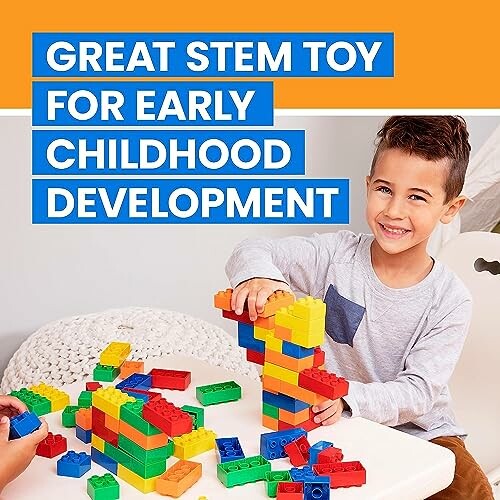 Child playing with colorful building blocks for STEM development