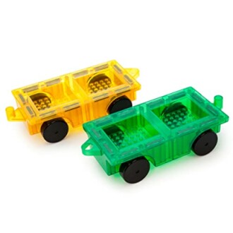 Yellow and green toy train cars with black wheels.