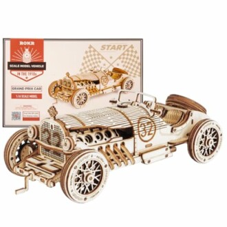 Wooden scale model of a vintage Grand Prix car with packaging.