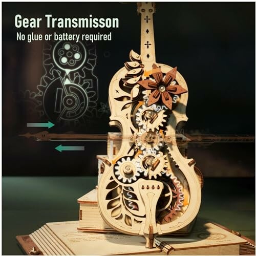 Wooden violin model with intricate gear design.