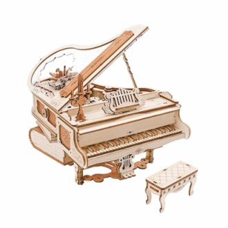 Intricate wooden puzzle model of a grand piano with a matching bench.